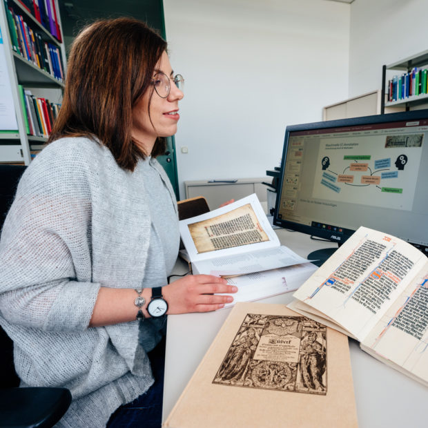 A student is researching her master thesis